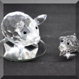 C34. Swarovski Crystal pigs. 